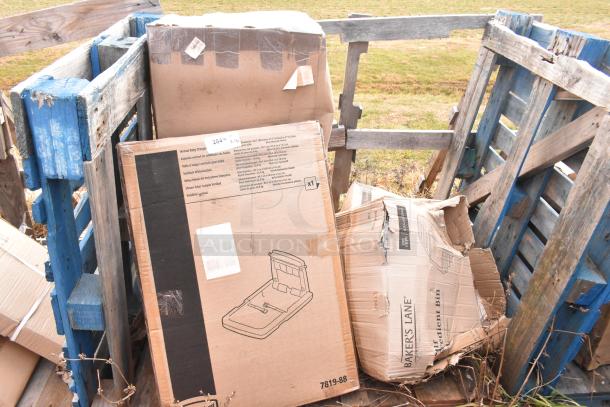 Four packaged items including a Baker's Lane 6.3 Gallon Ingredient Bin visible. Boxes are slightly dented.