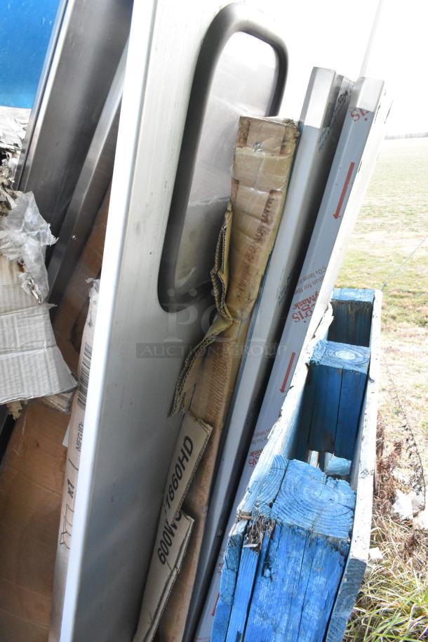 11 brand new scratch and dent items, including 600WS1860HD Regency 16-gauge stainless steel 18"x60" heavy-duty wall shelf in packaging.