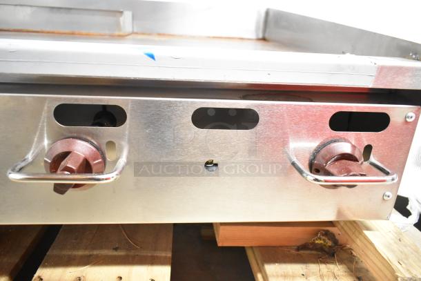 Wolf AGM48-101 stainless steel commercial countertop flat top griddle, natural gas, 108,000 BTU, durable knobs.