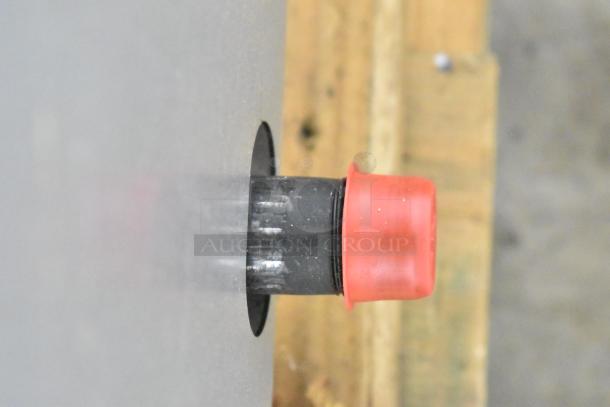 Stainless steel surface with a red knob, part of Wolf AGM48-101 commercial gas griddle, 108,000 BTU.