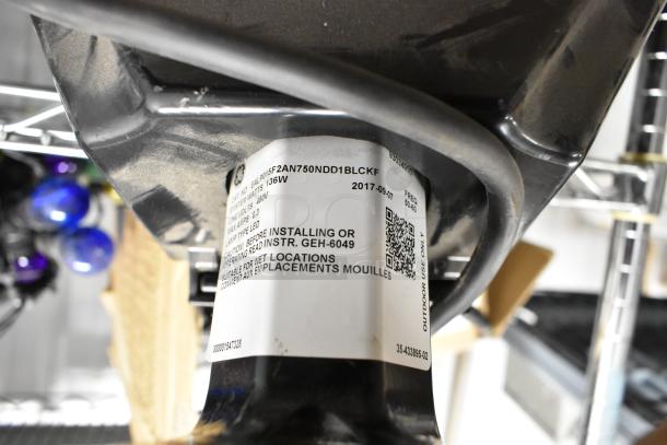 4 GE flood lights, models 93129352 and 1547328, 136W, LED, outdoor use, suitable for wet locations, includes QR code.