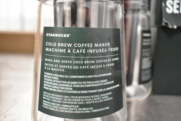 Starbucks cold brew coffee maker with label detailing usage instructions, in new condition. Part of 10-item auction set.