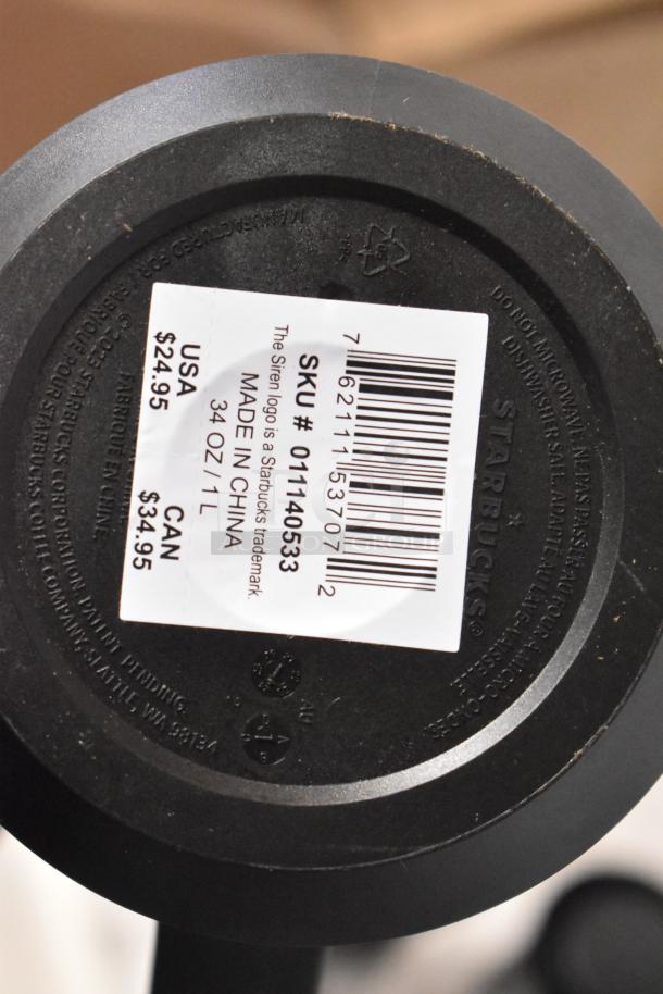 Bottom of a Starbucks cold brew coffee maker showing SKU #01140533, Made in China, $24.95 USA price tag.