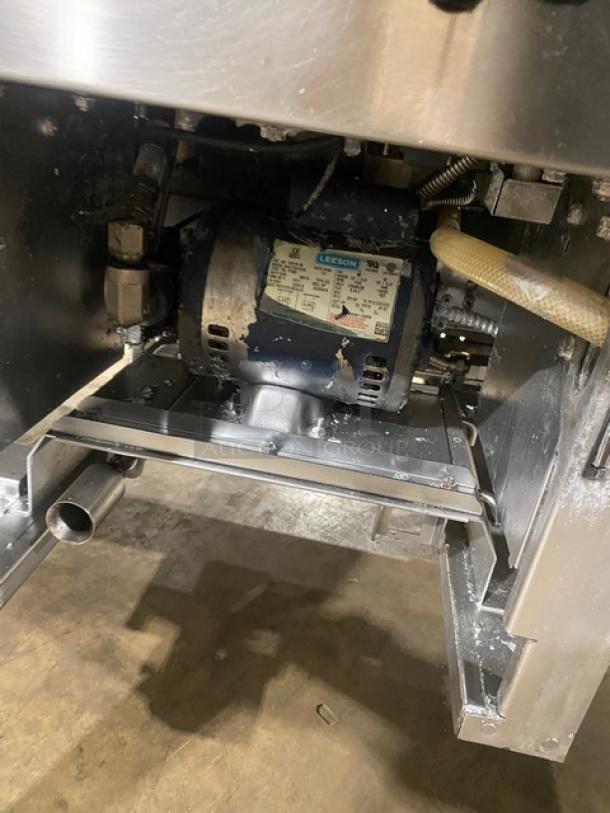 Henny Penny Evolution Elite Series EEG-253 fryer system motor detail. Stainless steel, natural gas, on casters. Model, serial tags visible.