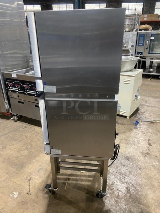 Moffat Turbofan Series E23M3 double stacked half-size convection oven, stainless steel, 220-240V, on casters with stand.