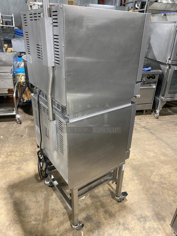 Moffat Turbofan Series E23M3 double stacked convection oven, stainless steel, electric, on casters, with equipment stand.