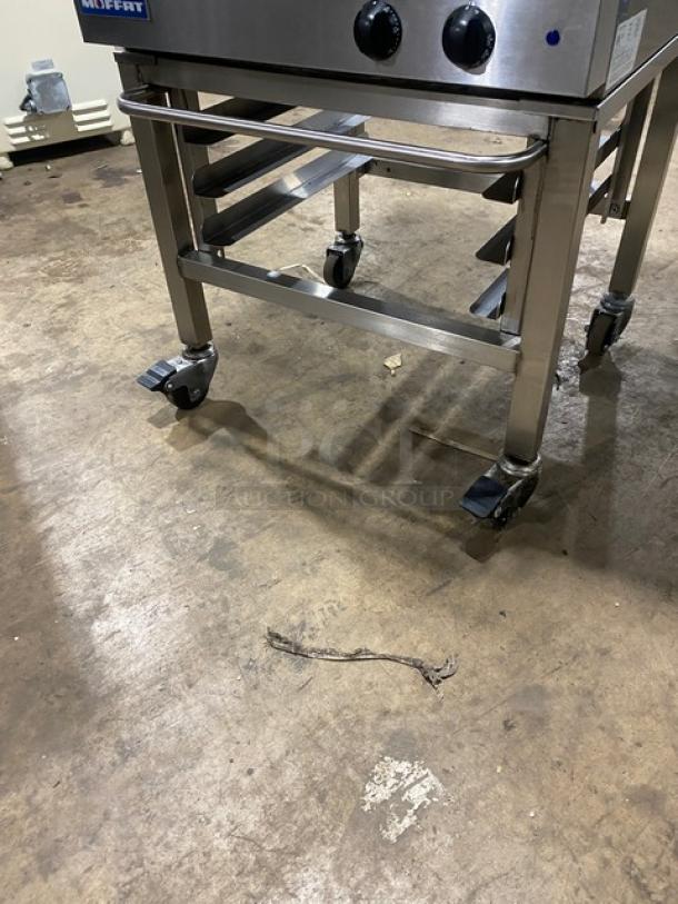 Moffat E23M3 Turbofan Series stainless steel convection oven on casters with pan holding stand, excellent condition.