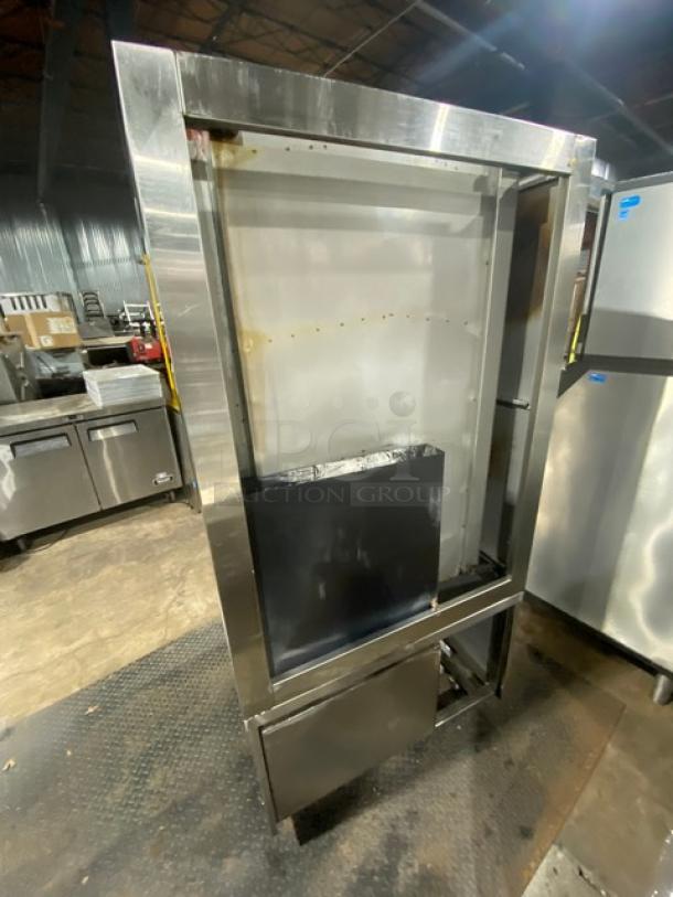 Commercial stainless steel seafood steamer with 3 compartments, individual controls, wired oven rack, and sturdy legs.