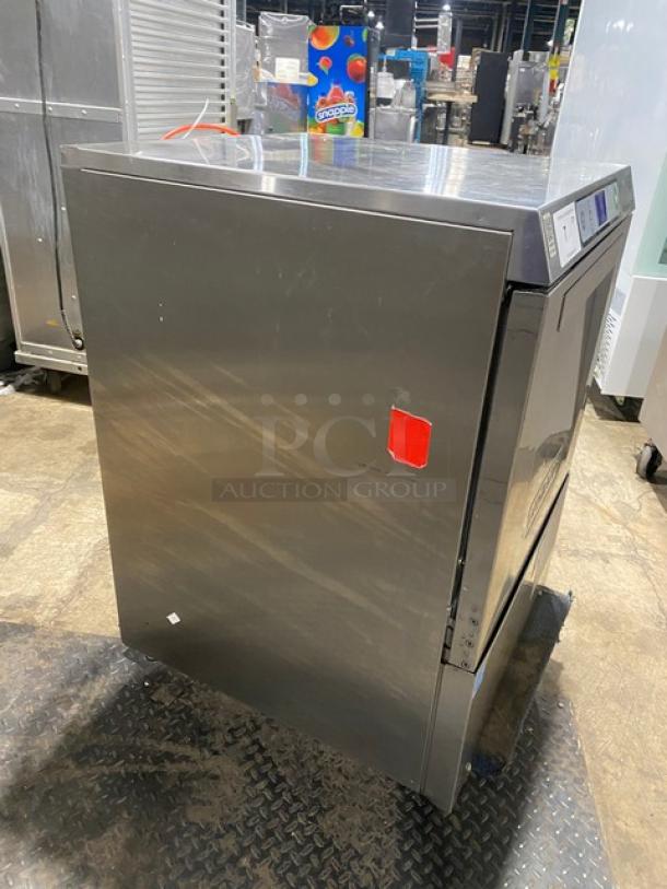 Hobart LXEH commercial stainless steel dishwasher; undercounter style; includes full-size peg rack; electric; 120/208-240V; 1 Phase; new body style; model: LXEH; SN: 231229219; features control panel on front; minor surface blemishes.