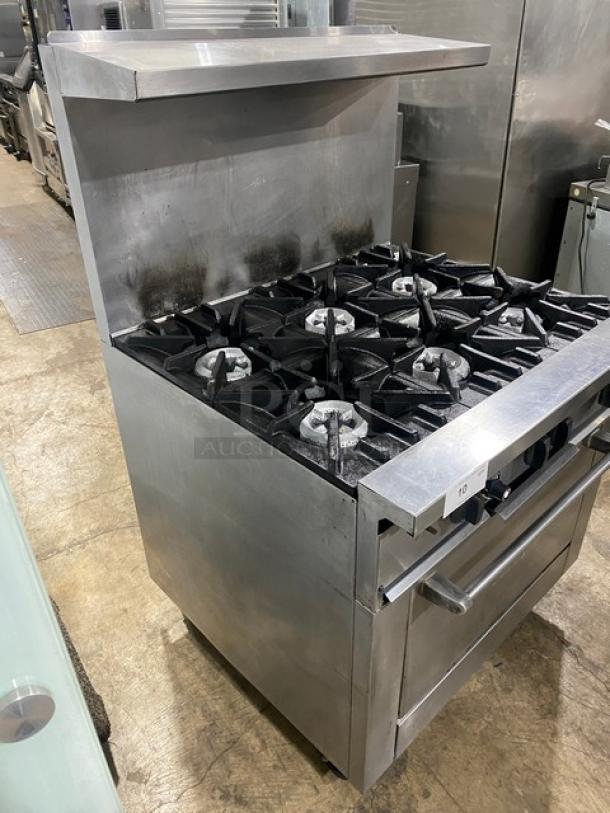 SunFire stainless steel 6-burner range/oven combo with backsplash, overhead salamander shelf, wired oven rack, on casters.