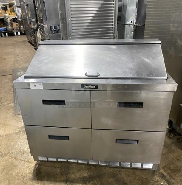 Delfield 4-drawer refrigerated prep table, Model D4448N-18M, stainless steel, Bain Marie style, excellent condition.