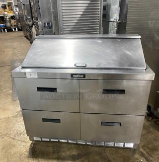 Delfield 4-drawer refrigerated prep table, Model D4448N-18M, stainless steel, Bain Marie style, excellent condition.