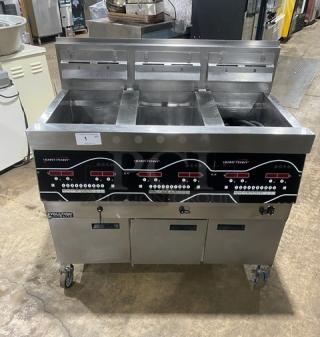 Henny Penny Evolution Elite EEG253 triple bay fryer, stainless steel, natural gas, backsplash, basket hanger, on casters.