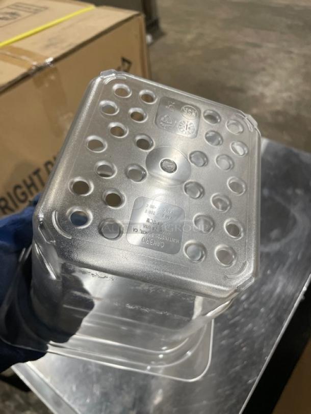 Cambro Camwear clear 1/6-size colander pan, model 65CLRCW135. New condition, 5" deep, with visible drainage holes.