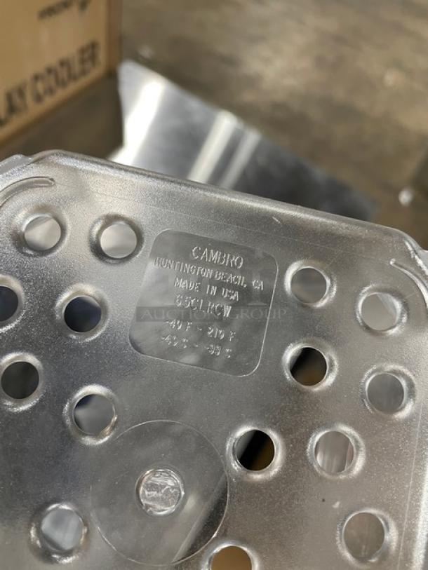 Cambro Camwear 65CLRCW135 colander pan in clear plastic, 1/6-size, 5" deep. New condition, marked "Made in USA."