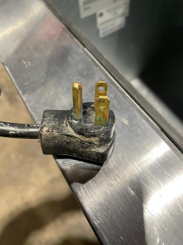 Beverage-Air DW49 cooler plug on stainless steel top, showing 115V, 1-phase electrical connector.