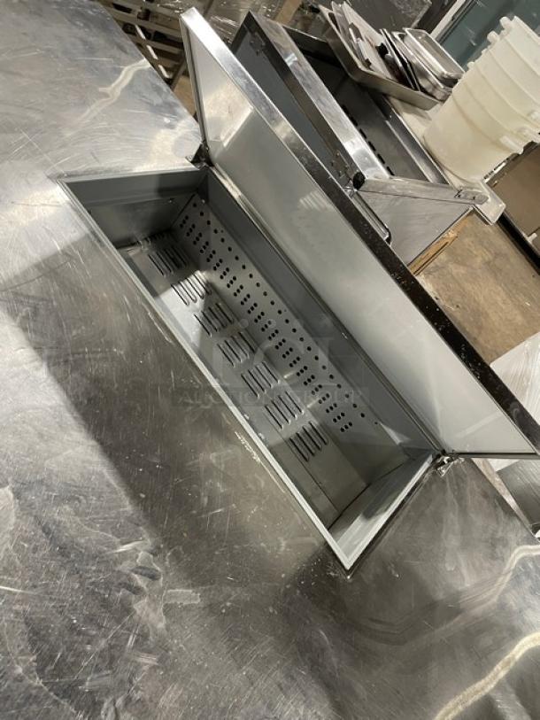 Continental stainless steel prep table, model RA68NB, 2-1/2 doors, poly-coated wire rack, on casters, 115V.