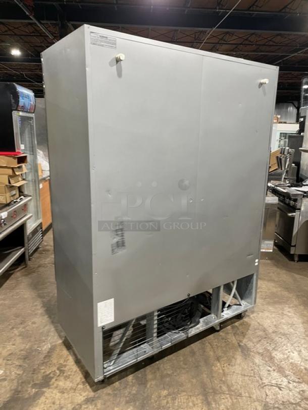 Fogel CR-49-SDF commercial stainless steel 2-door reach-in freezer with poly coated wired rack, casters, 115V.