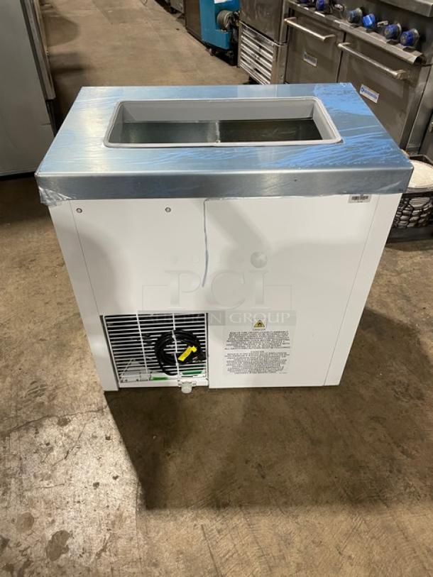 New Master-Bilt DC2S 32" ice cream dipping cabinet with flip-style lid, commercial-grade, white, 115V, pristine condition.
