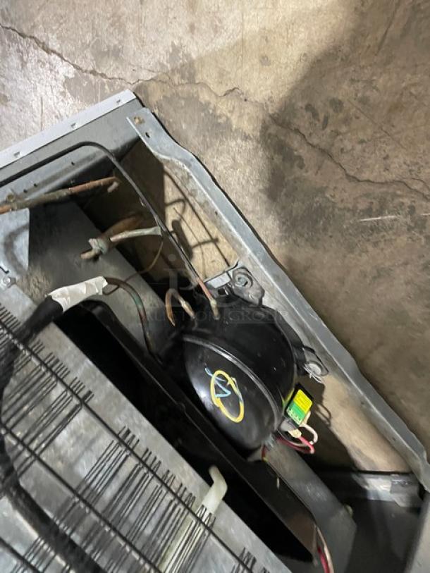 Commercial white top-freezer/refrigerator combo model MRT18DNEWO. Features poly-coated wire racks, pull-out drawers, 115V.