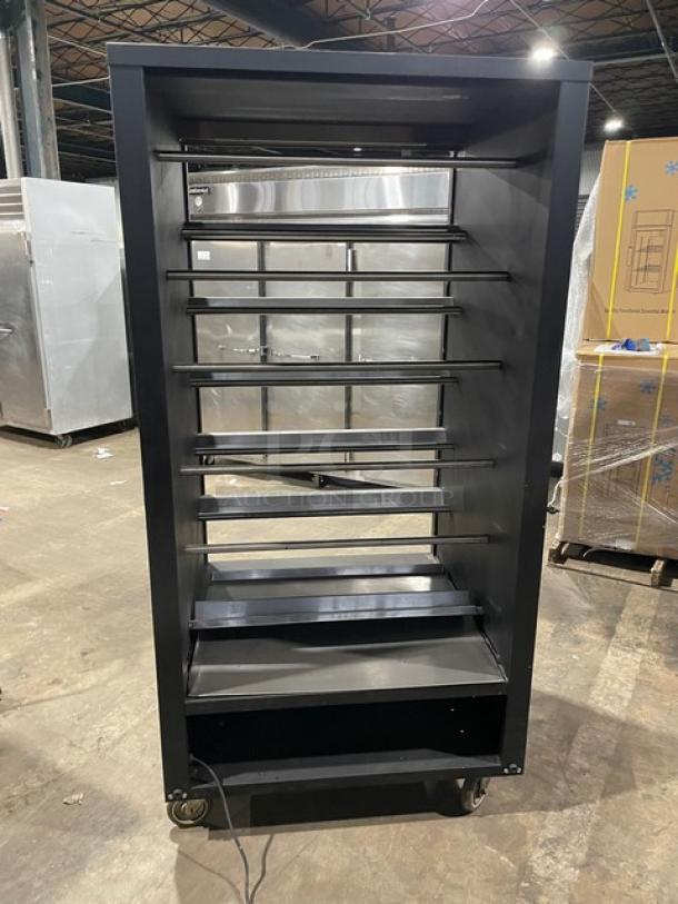 Vulcan Commercial 5-Tier Bakery Display, Model 1013776, black with stainless steel interior, enclosed storage, on casters.