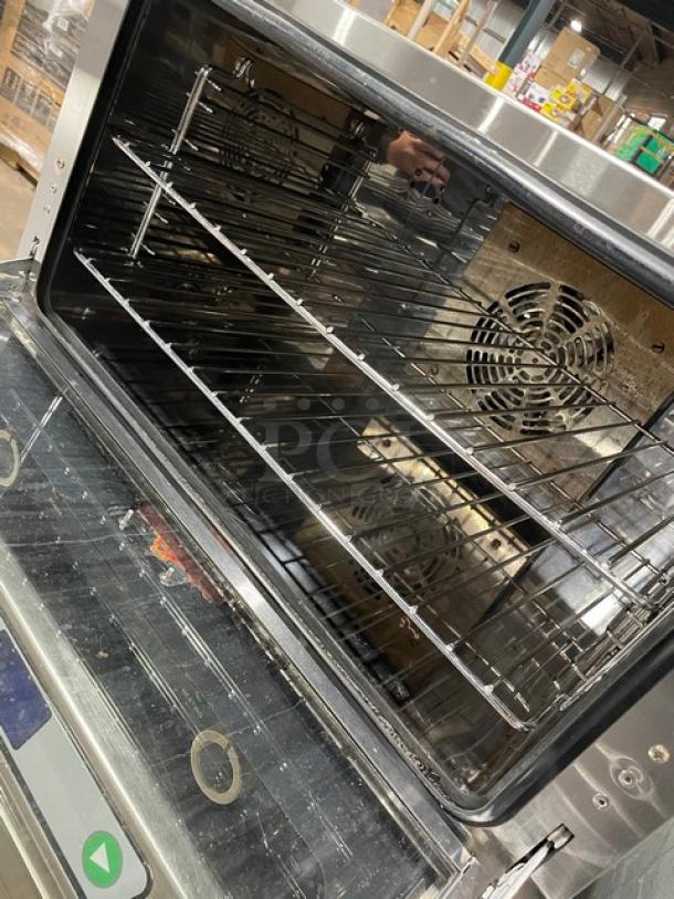 Kitma KMCC50 2020 countertop convection oven, stainless steel, thermostatic control, electric, half-size, on legs, interior view.