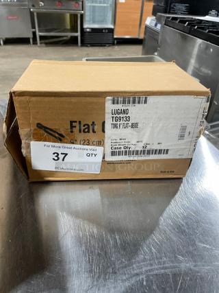 Cambro Commercial Beige 9" Flat Serving Tongs, Model TG9133, new in box with labels indicating product details.