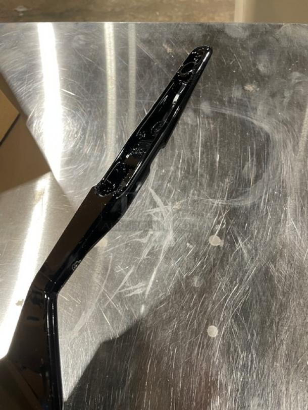 New Cambro Camtensil Series 14" black high heat solid turner/spatula, pristine condition, ideal for commercial use.