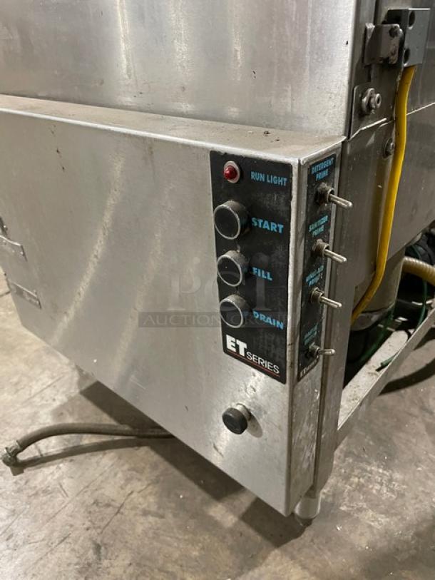 American Dish Service ET Series stainless steel undercounter dishwasher, 120V, features control panel with start, fill, and drain buttons. Serial number WWS080206.