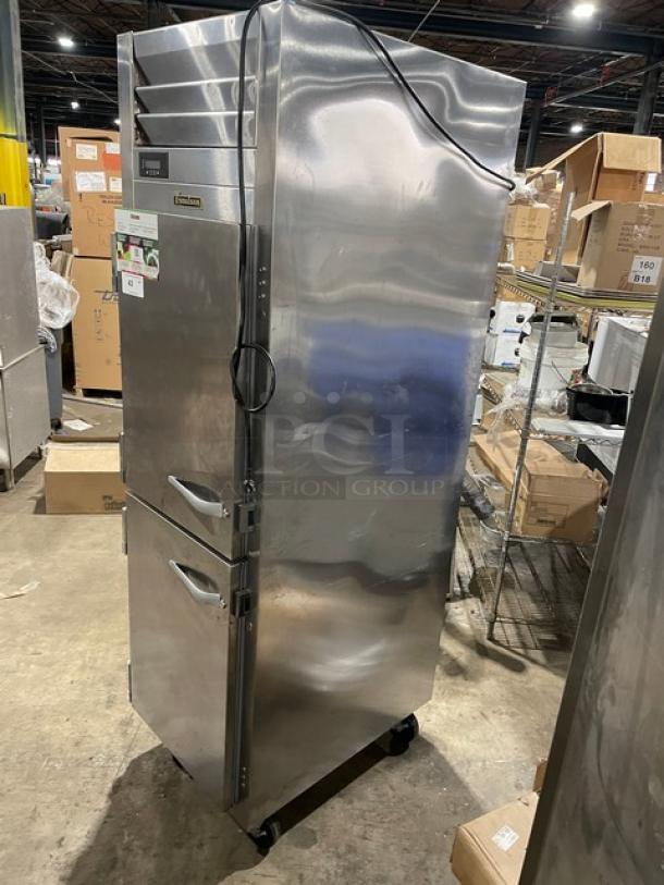 Traulsen AHT132DUT-HHS stainless steel half door reach-in refrigerator, solid doors, wired racks, on casters, 115V, 1 Phase.