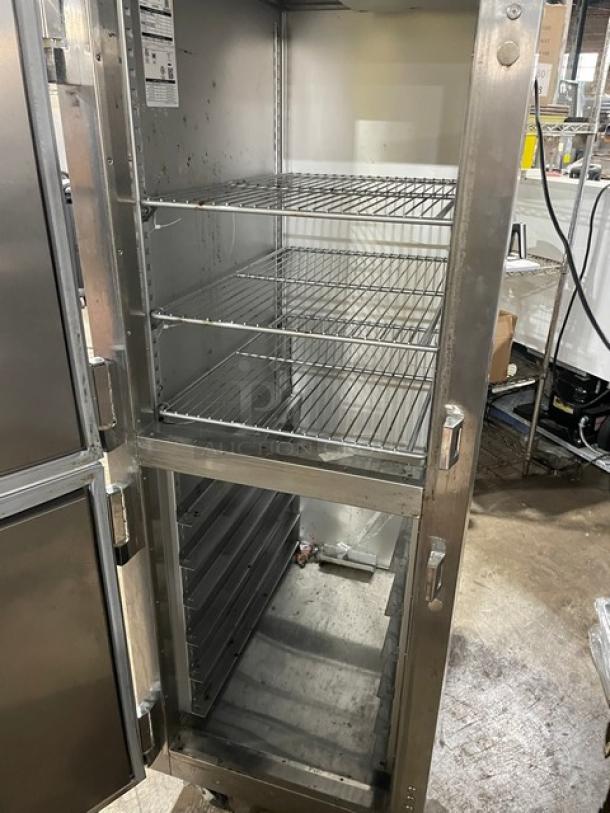 Traulsen AHT132DUTHHS stainless steel reach-in refrigerator with wire racks, solid half door, on casters, 115V, single phase.