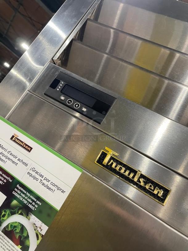 Traulsen stainless steel half door fridge, AHT132DUTHHS model, digital controls, Traulsen logo, excellent condition.