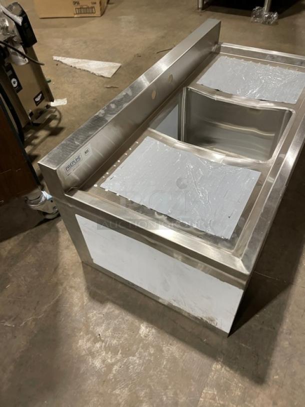 Prepline stainless steel handwashing sink with left/right drain boards, 3" backsplash. Model BAR-1C-LR, new condition.