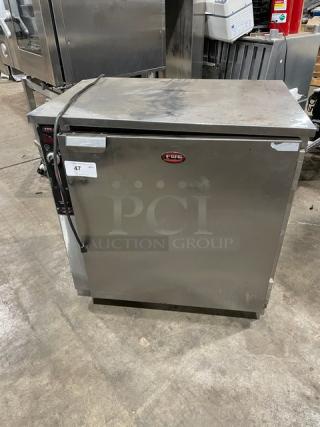 FWE stainless steel countertop heated holding cabinet, model HLC-SL1826-8-CHP, electric, with wired racks, on casters.