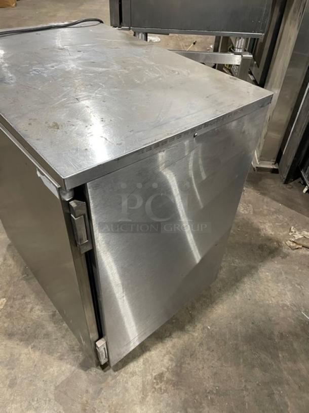 FWE stainless steel countertop heated cabinet, model HLC-SL1826-8-CHP. Features wired racks, 120V, 1 phase, on casters.