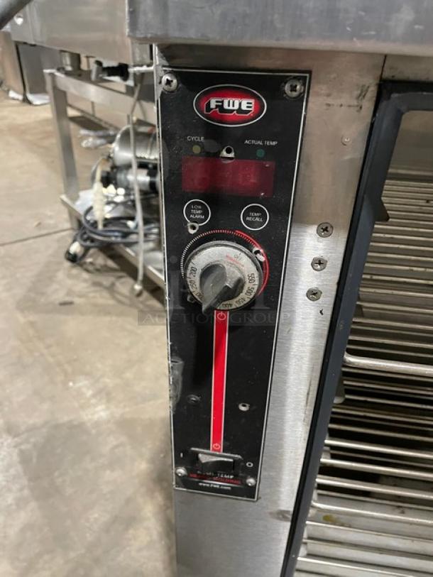 FWE stainless steel electric warming cabinet, Model HLC-SL1826-8-CHP, with wired racks, 120V, on casters. Control panel shown.