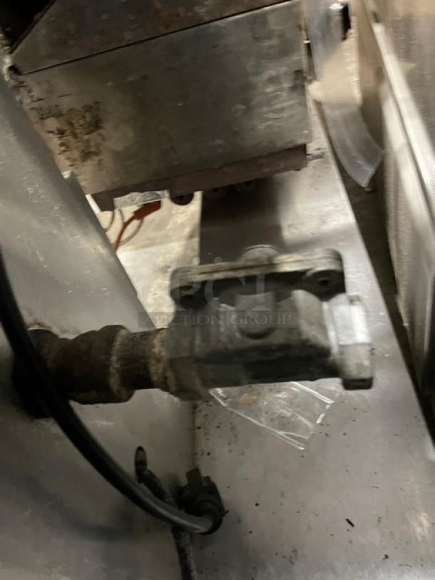 Groen 40 Gal. Stainless Steel Tilting Steam Kettle, model DHT/1-40, natural gas, on legs, used condition, serial 64233.