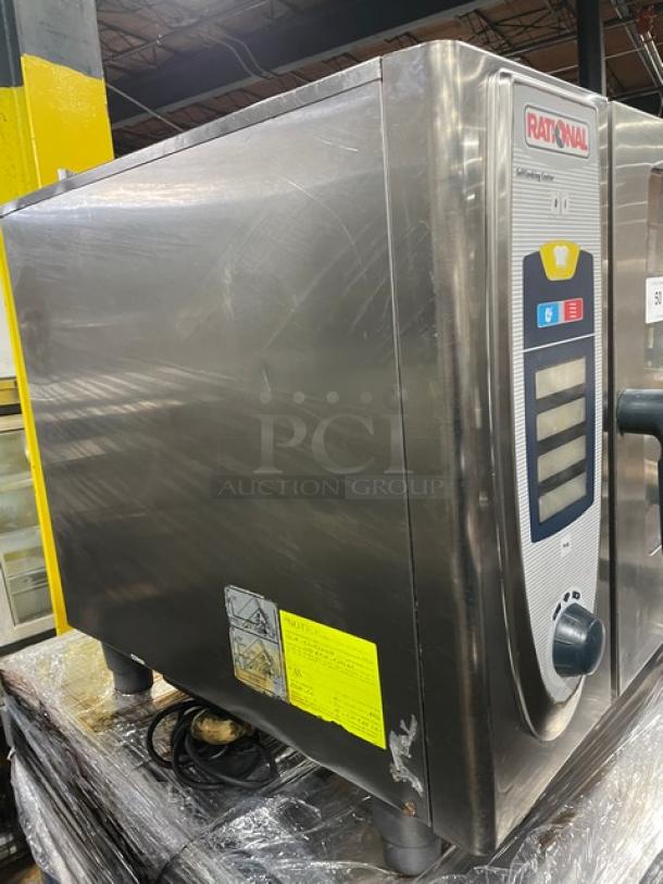 Rational SelfCooking Center Series stainless steel combi oven, commercial-grade, with built-in pan slide and on legs.