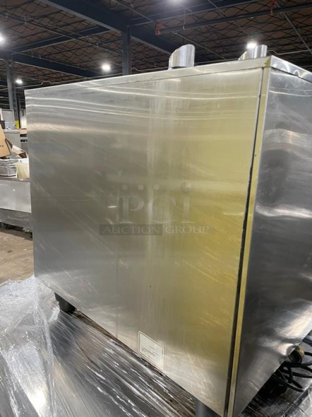 Rational SelfCooking Center Series commercial combi oven, stainless steel, with built-in pan slide, on legs, excellent condition.