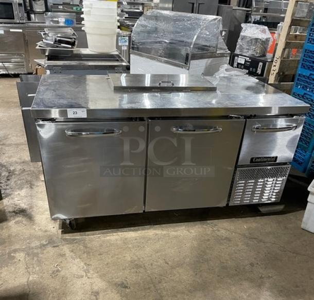 Continental Commercial Stainless Steel Prep Table, Model RA68NB, 2-1/2 doors, poly-coated rack, 115V, on casters, used condition.