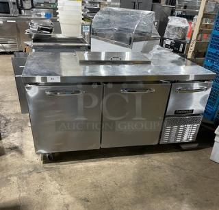 Continental Commercial Stainless Steel Prep Table, Model RA68NB, 2-1/2 doors, poly-coated rack, 115V, on casters, used condition.