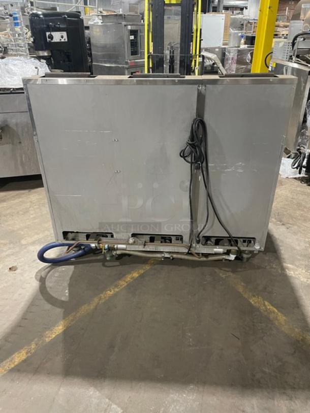 Pitco Model SRTG stainless steel 3-bay pasta cooker, late model, 17.5 Gal, natural gas, 115V, with back splash, on casters.