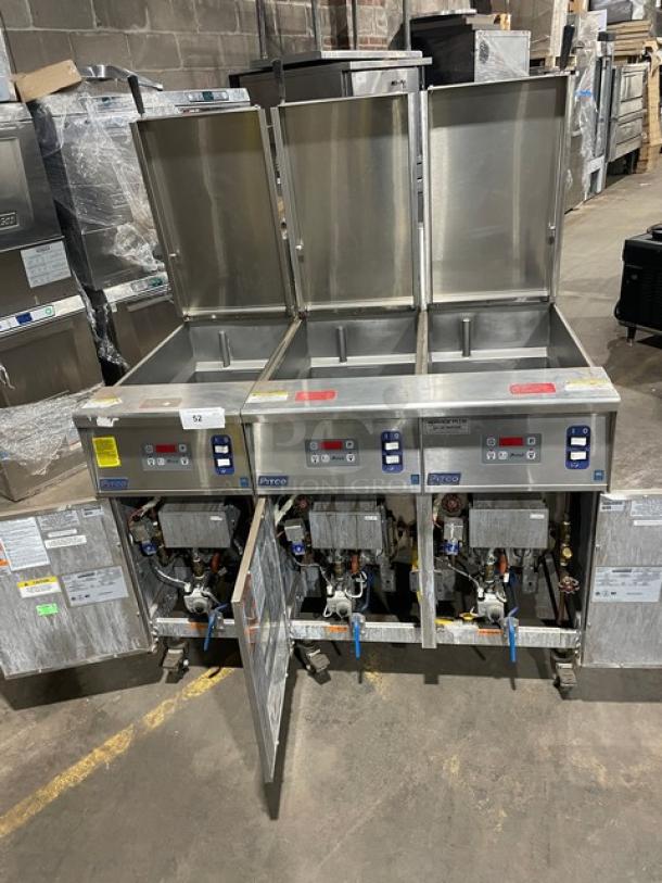 Pitco SRTG 3-bay stainless steel pasta cooker, natural gas, 17.5 gal, with back splash, on casters, model SN: G16AD007609.