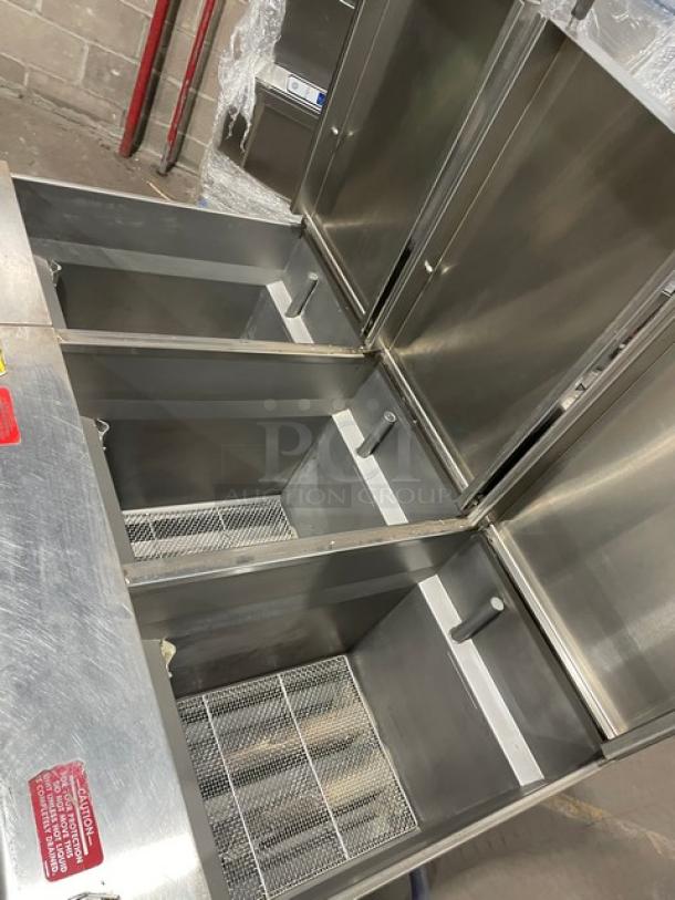 Pitco SRTG 3-Bay Pasta Cooker, stainless steel, natural gas, 17.5 gal capacity, with backsplash, on casters, model SN: G16AD007609.