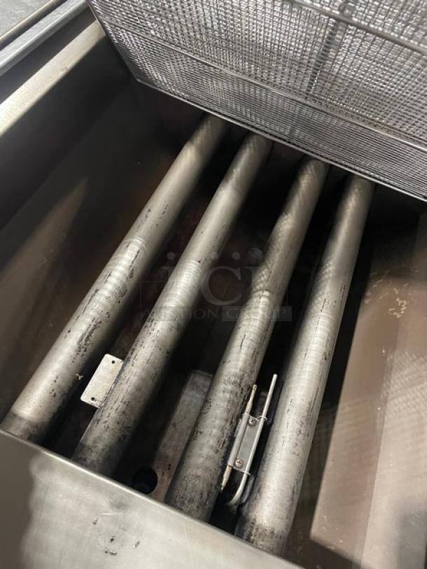 Pitco DD24RUFM stainless steel donut fryer, natural gas, 117 lb capacity, with backsplash, on legs, 120V, 1 phase.