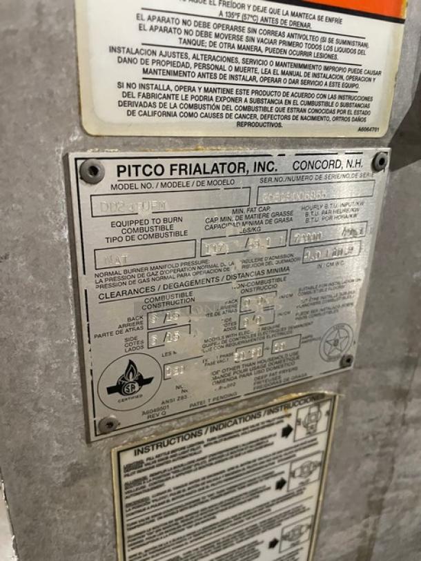 Pitco donut fryer model DD24RUFM label, Concord, NH, detailing specifications and safety instructions, in used condition.
