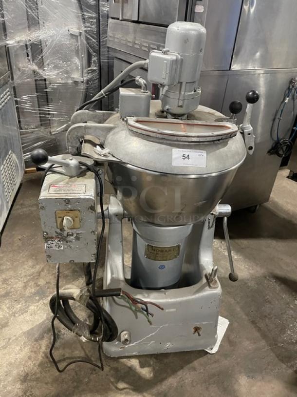 Hobart VCM40 commercial mixer with 40 qt. stainless steel tilting bowl and lid. Features electric power and durable design.