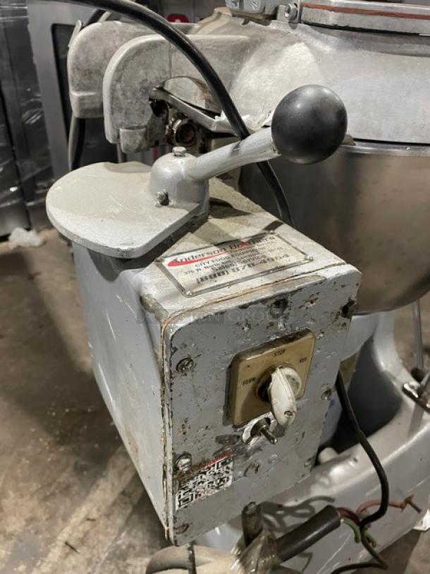 Hobart VCM40 commercial electric 40 qt. chopper/mixer with tilting stainless steel bowl and lid, showing control panel and lever.