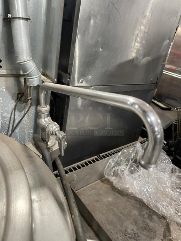 Groen 40 Gal. Stainless Steel Steam Jacketed Kettle, Model AH140, with swing spout faucet, on legs, natural gas powered.