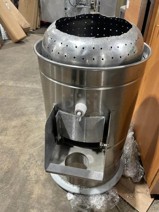 Omcan Elite Series stainless steel potato peeler, model PE-BR-0010, 22 lb capacity, electric-powered, in excellent condition.